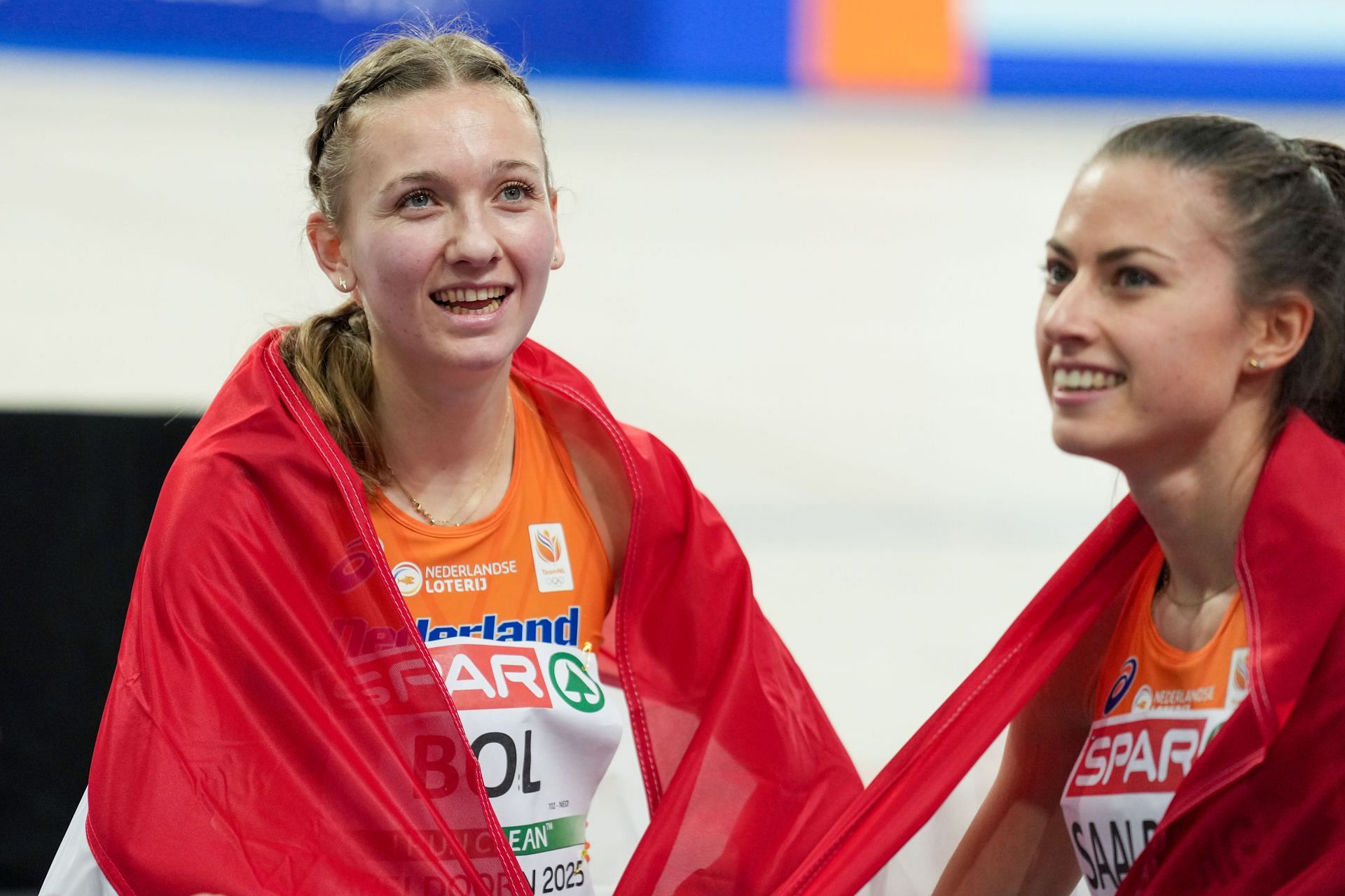 Bol with her teammate during the 4x400m mixed relays on day one of the 2025 European Indoor Championships (Image via: Getty Images)