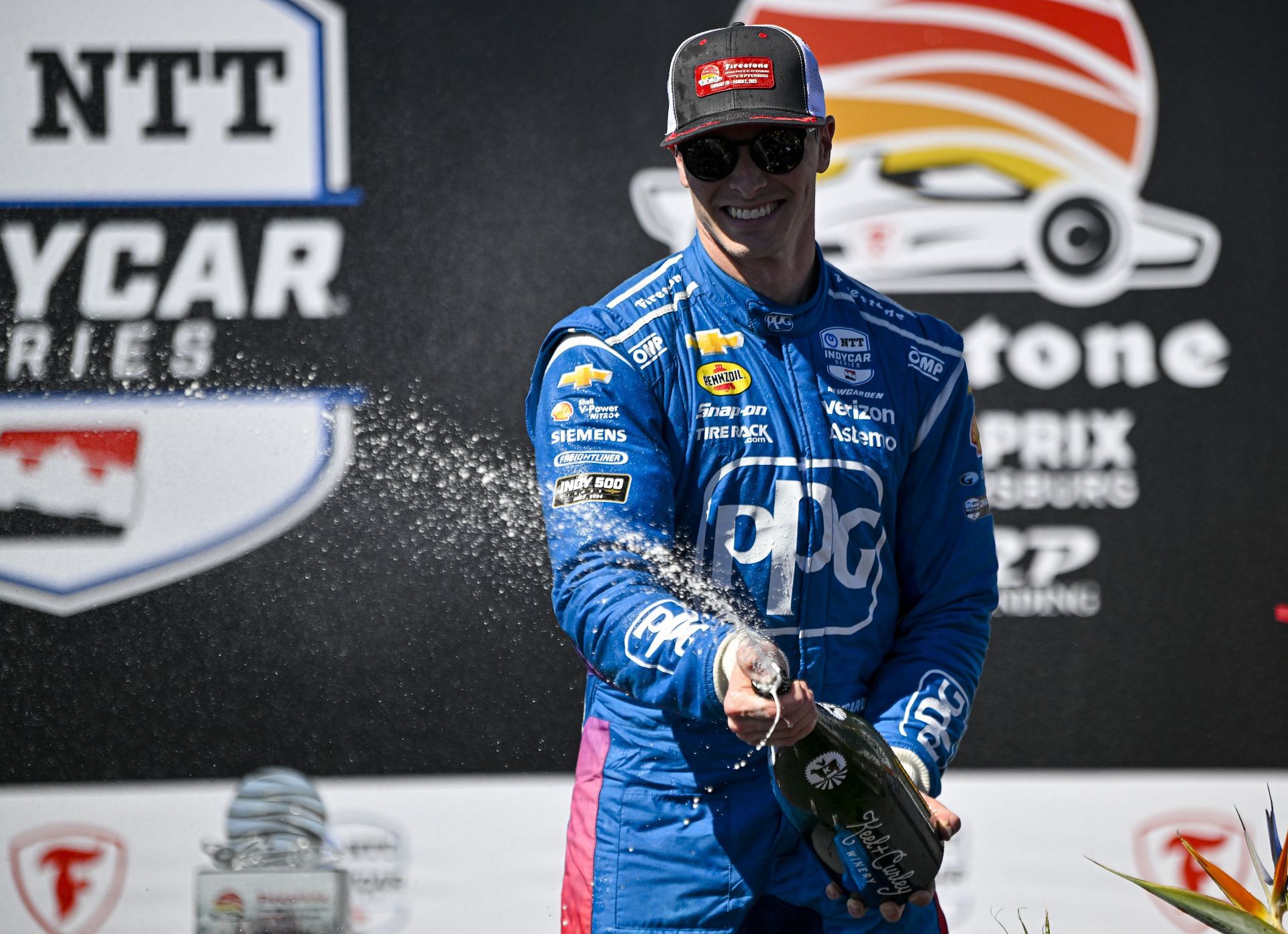 Josef Newgarden on the podium after his third place finish at the Grand Prix of St. Petersburg - Source: Getty