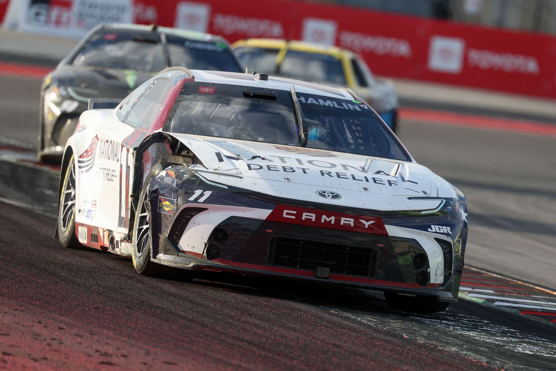 Denny Hamlin (#11 Joe Gibbs Racing National Debt Relief Toyota) speeds out of turn 20 during the NASCAR Cup Series Echo Park Automotive Grand Prix  - Source: Getty