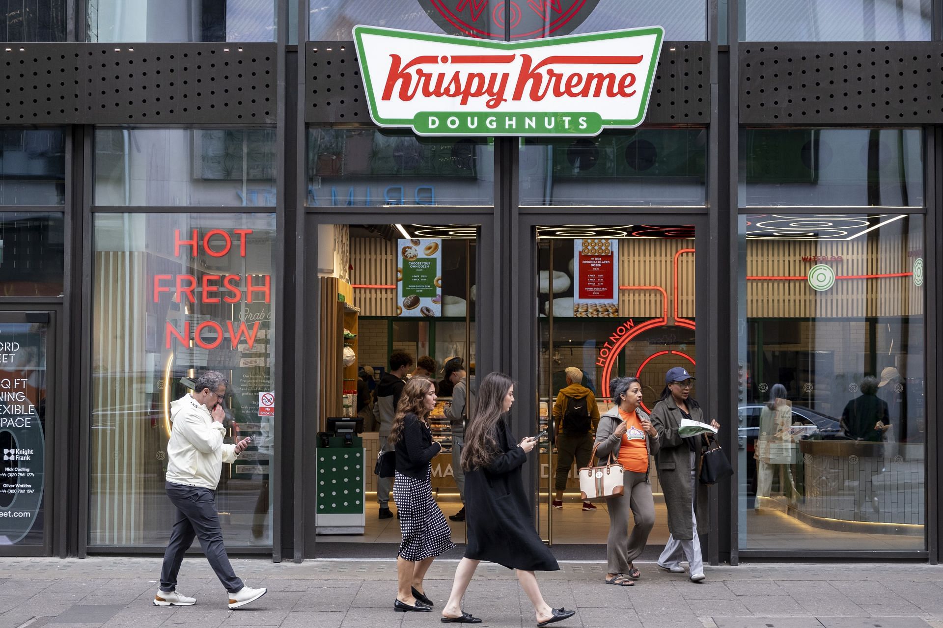 Make sure to check the Krispy Kreme shop to confirm participation. (Image via Getty)