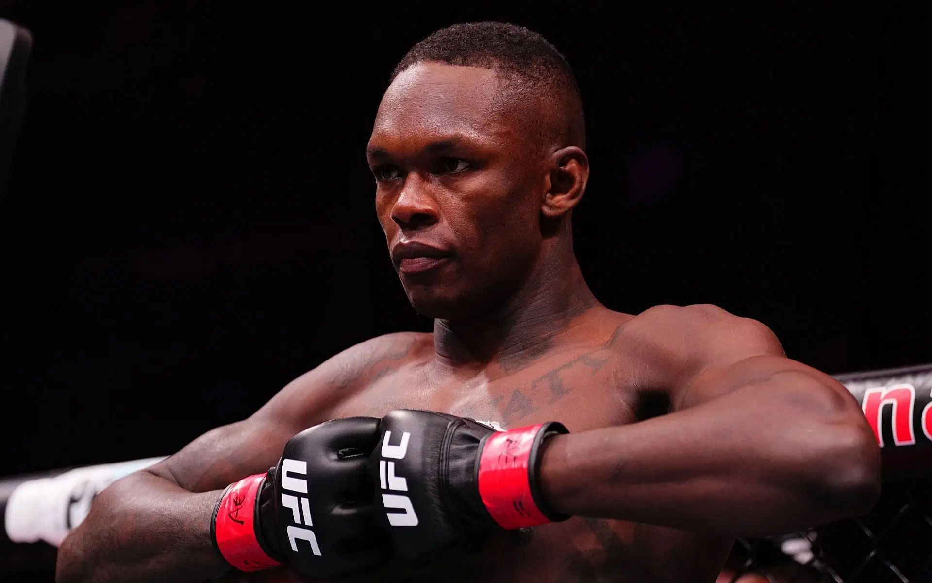 Israel Adesanya (pictured) offered advice by former opponent about his career path following three straight losses [Image courtesy: Getty Images]