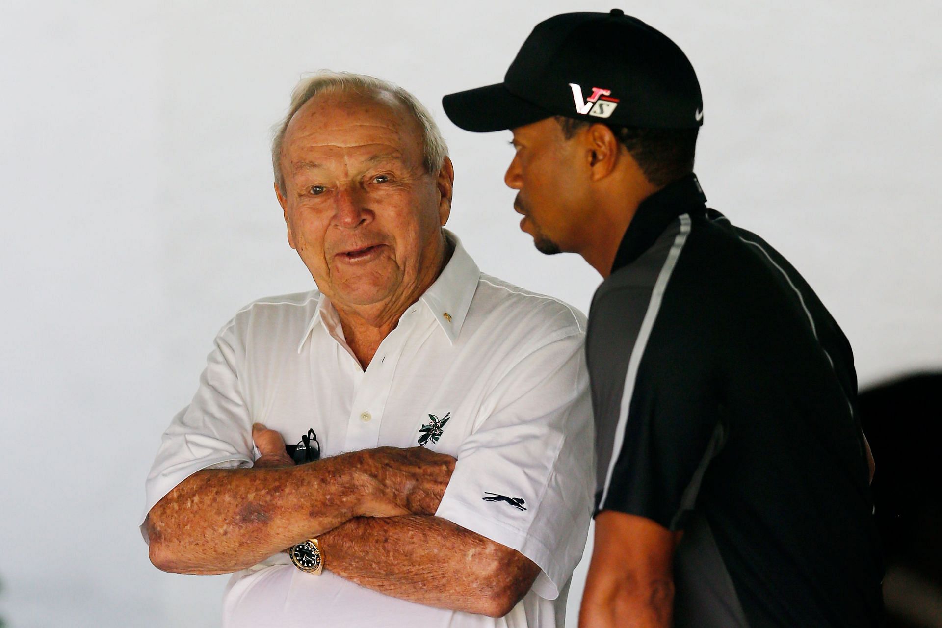 Palmer with Tiger Woods ahead of the 2013 U.S. Open (via Getty)