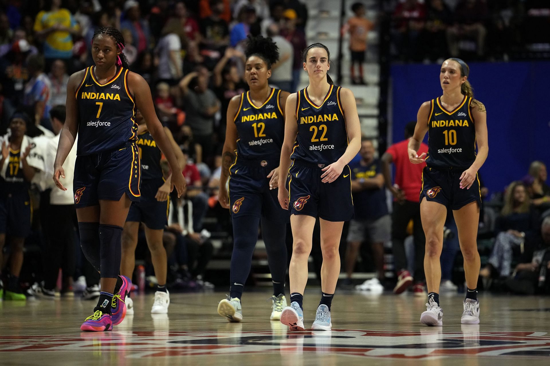 Aliyah Boston #7, Damiris Dantas #12, Caitlin Clark #22 and Lexie Hull #10 of the Indiana Fever take the court against the Connecticut Sun - Source: Getty