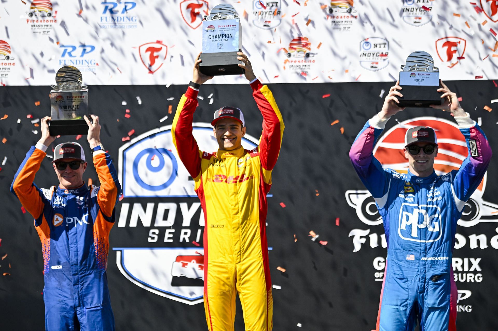 Alex Palou (1st), Scott Dixon (2nd) and Josef Newgarden (3rd) on the podium after the St. Petersburg Grand Prix - Source: Getty