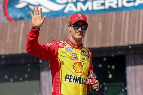  Joey Logano acknowledges fans during driver introductions before the NASCAR Cup Series Echo Park Automotive Grand Prix - Source: Getty