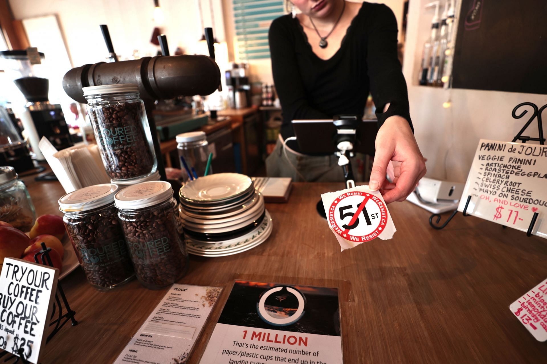 &#039;Canadiano&#039; sign at coffee shop in Toronto - Image via Getty