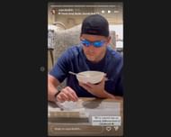 Denny Hamlin is playing Rummikub while having cereal with his partner, Jordon Fish. Source: Image via Instagram @xojordanfish