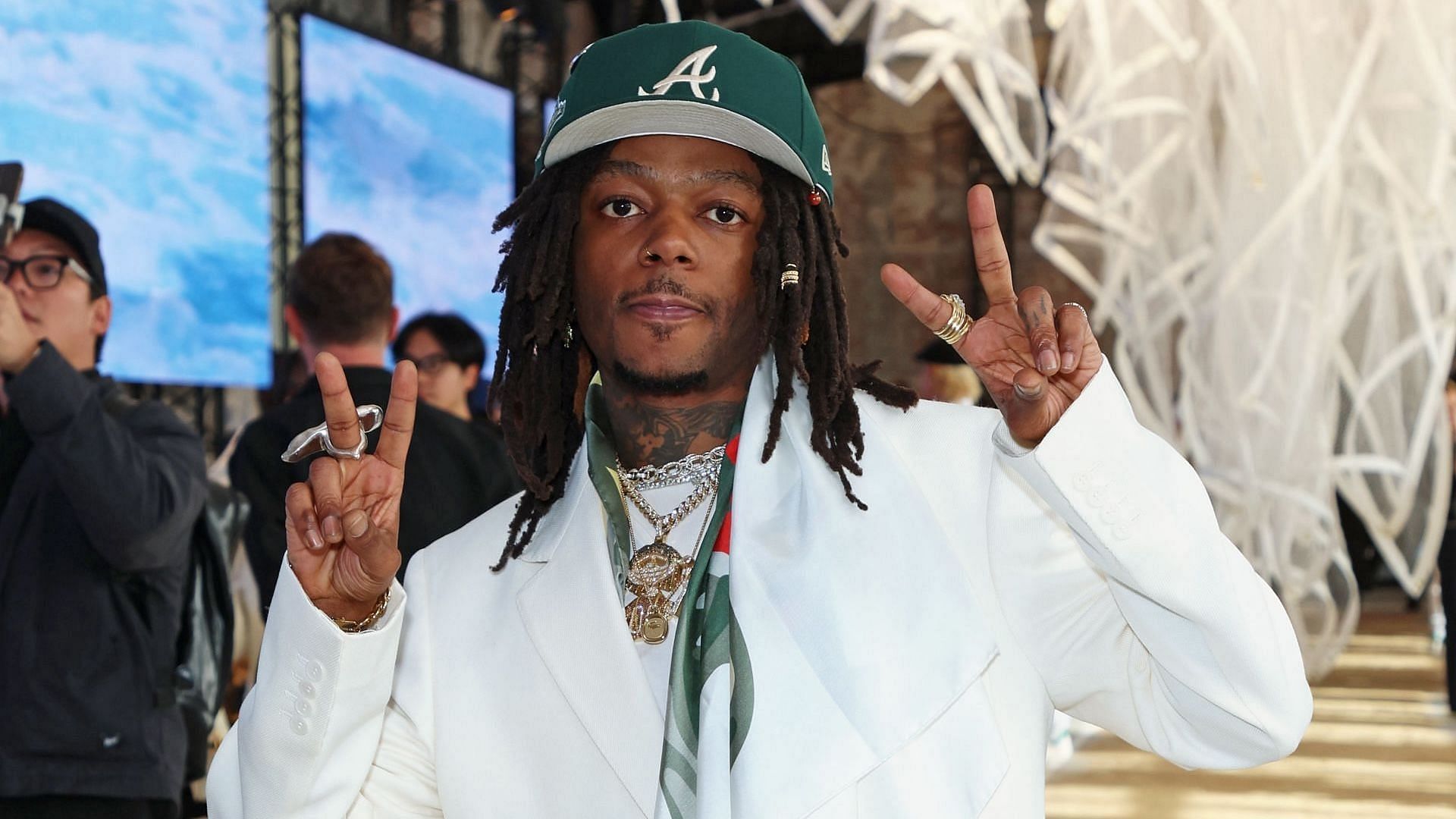 J.I.D aka Destin Choice Route attends the Lacoste SS25 Runway Show during Paris Fashion Week on October 1, 2024, in Paris, France. (Image via Getty/Dave Benett)