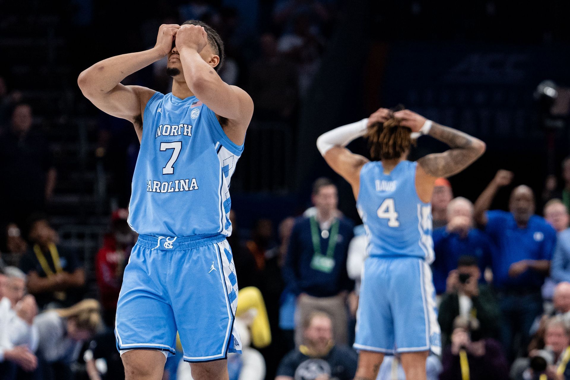 Seth Trimble (#7) and RJ Davis (#4) of the North Carolina Tar Heels react in the second half against the Duke Blue Devils during the semifinals of the ACC Tournament at Spectrum Center (Credits: Getty)