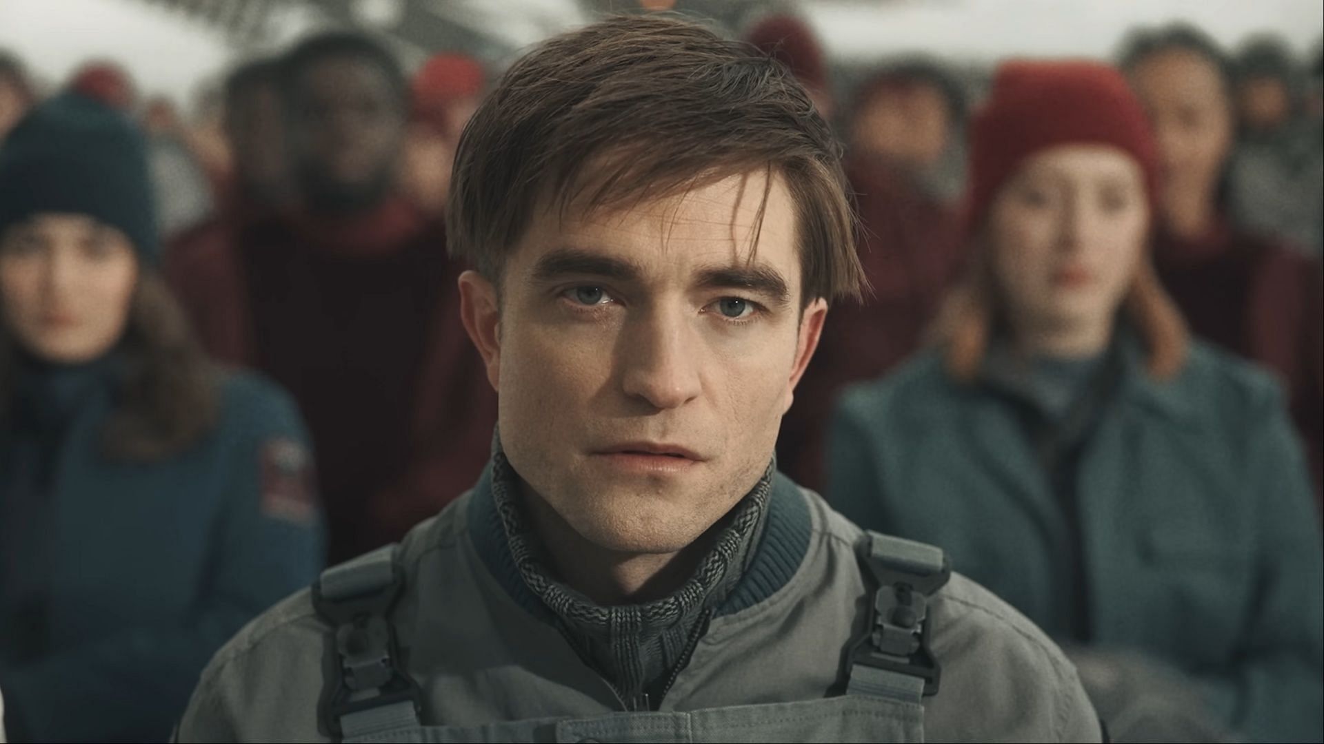 The upcoming sci-fi film is directed by Bong Joon-ho, starring Robert Pattinson (Image via YouTube/Warner Bros.)