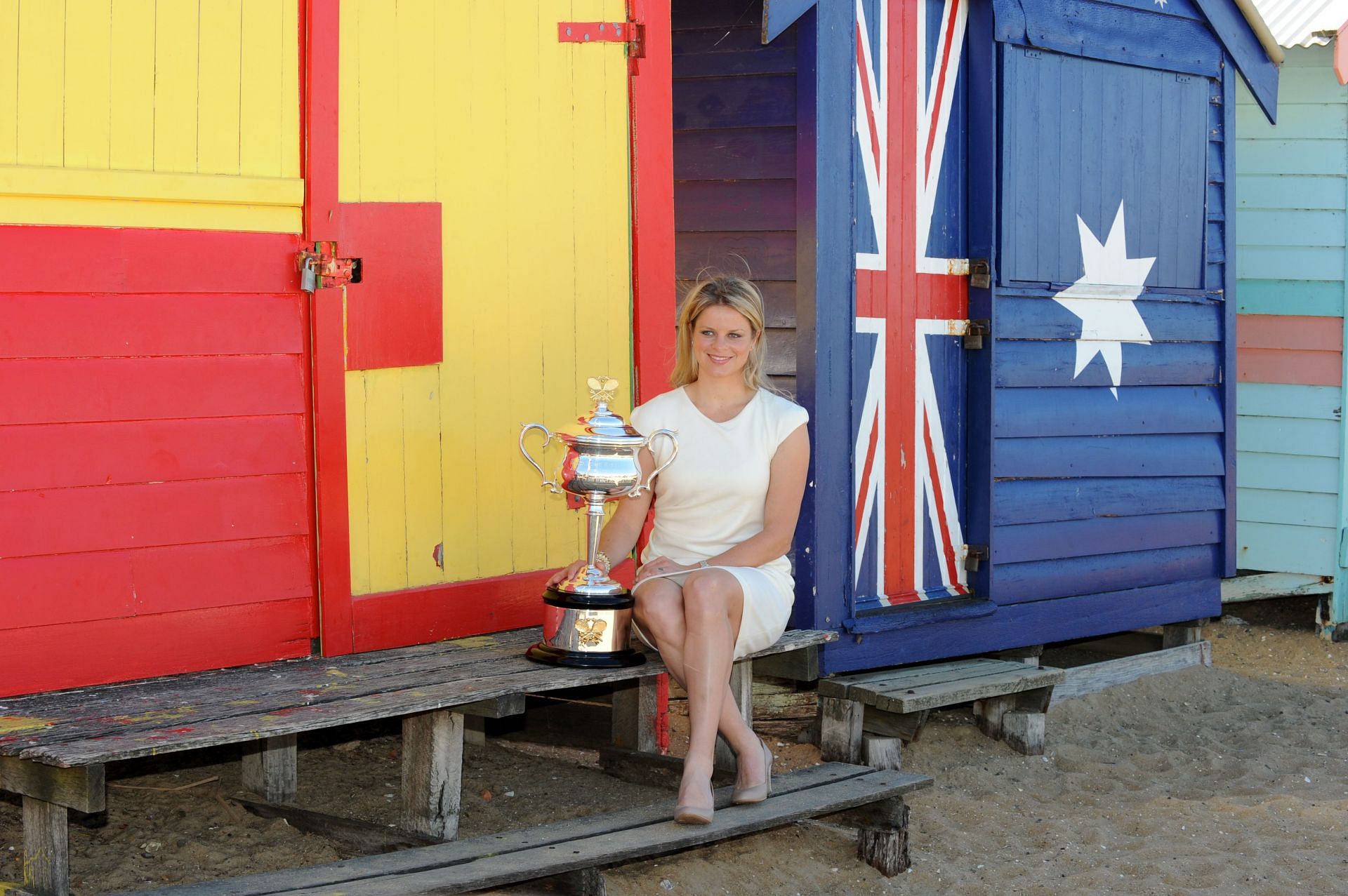 Kim Clijsters with the 2011 Australian Open trophy [Image Source: Getty Images]