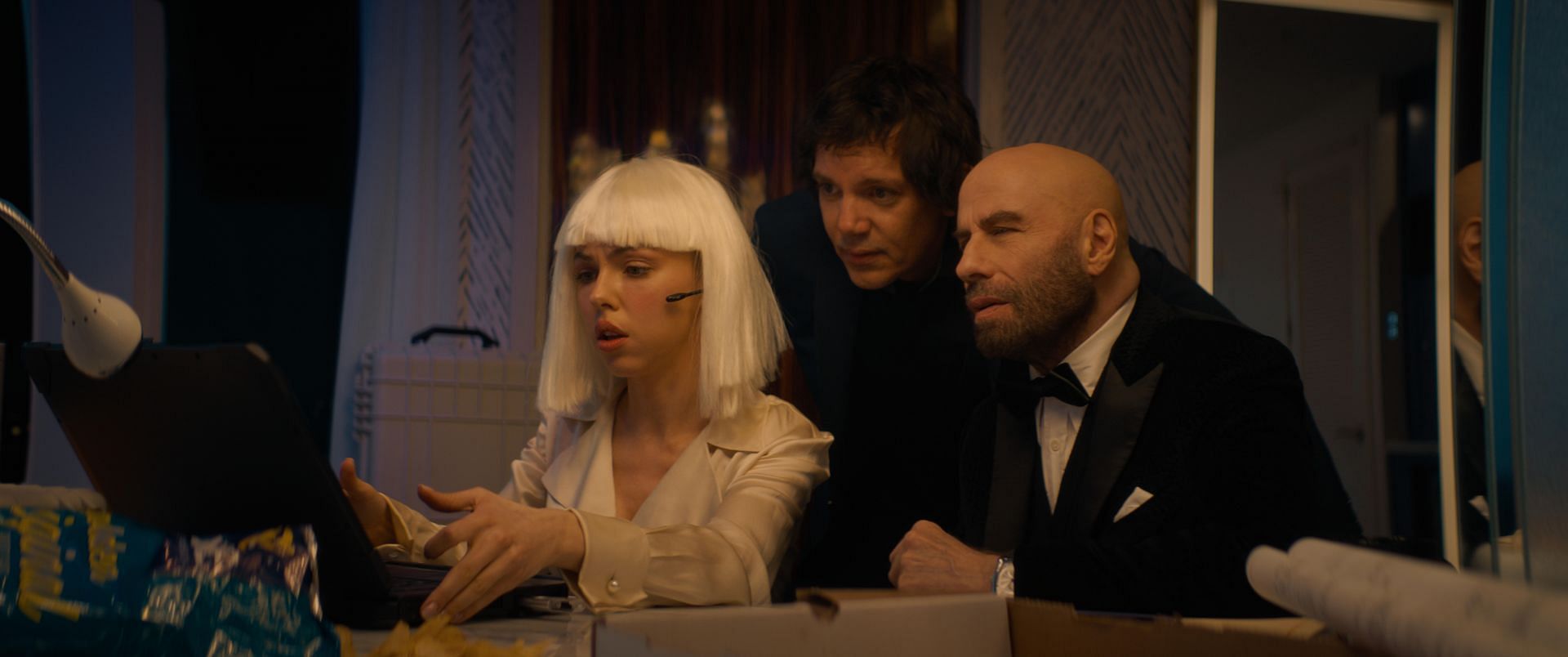 John Travolta, Lukas Haas and Natalie Yura in High Rollers. (Image via youtube.com)