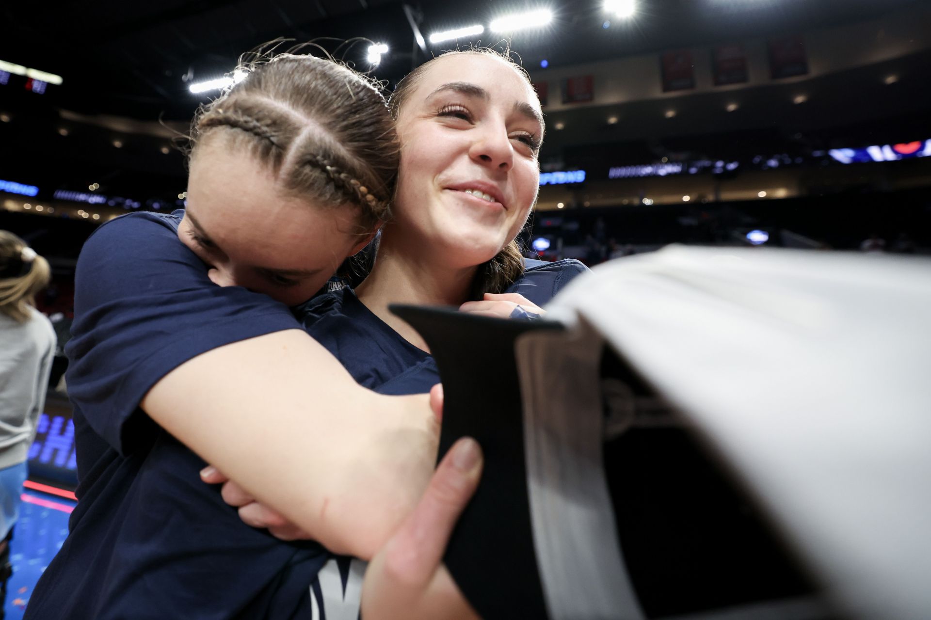 "Bring Nika Muhl to every March Madness game": College hoops fans react to Paige Bueckers & former UConn teammate cheesing for the camera