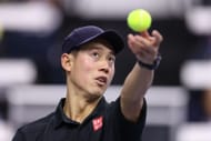 Kei Nishikori of Japan serves against Tomas Machac of the Czech Republic- Source: Getty