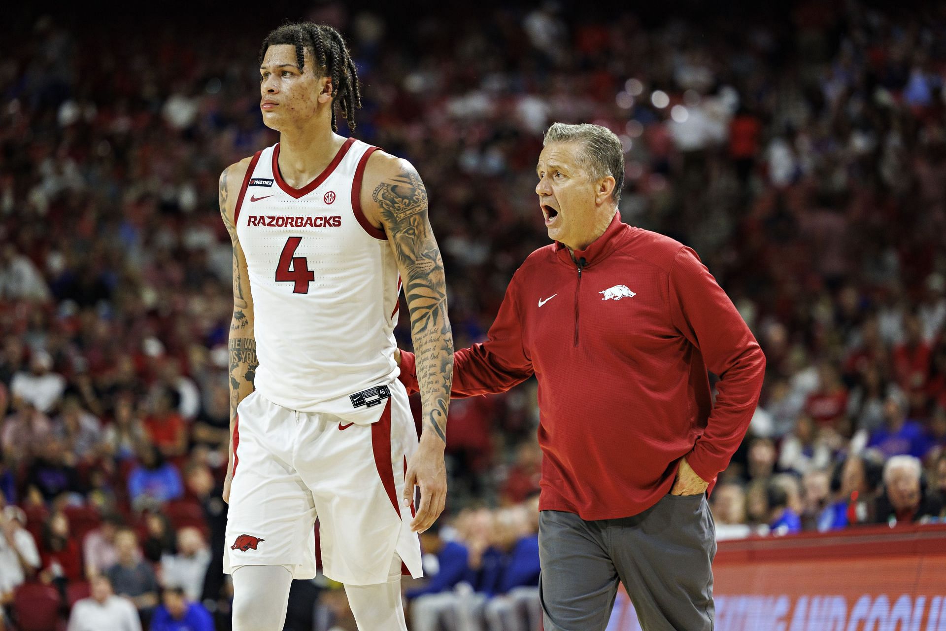 Head Coach John Calipari with Trevon Brazile #4 of the Arkansas Razorbacks during a game against the Kansas Jayhawks at Bud Walton Arena on October 25, 2024. Photo: Getty