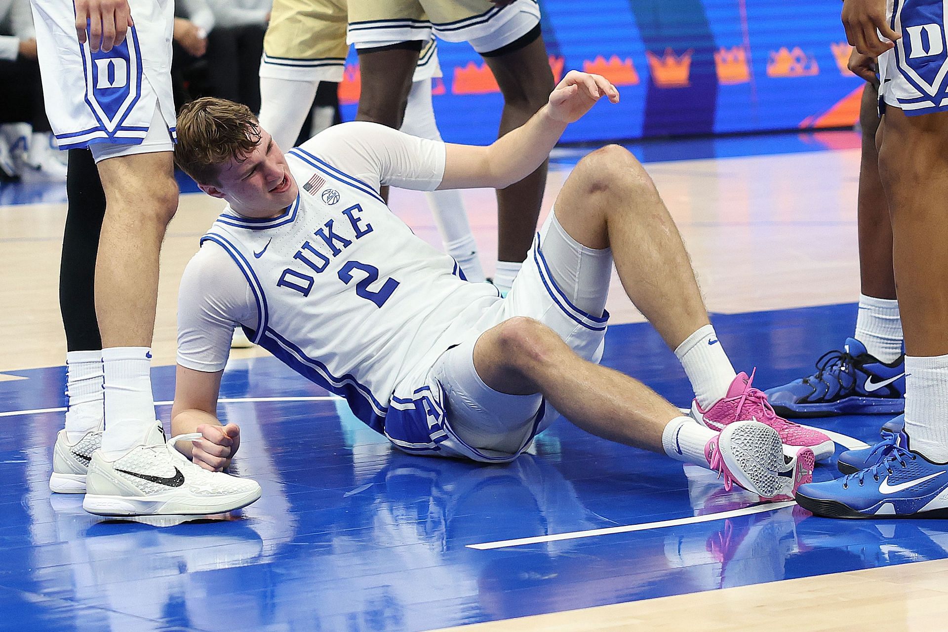 Duke Blue Devils guard Cooper Flagg is on the floor after suffering an ankle injury in the first half of their ACC Tournament game against the Georgia Tech Yellow Jackets. Photo: Getty