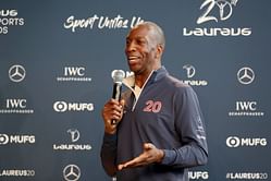 Grand Slam Track founder Michael Johnson reacts to the use of Wavelight technology at 2025 European Indoor Championships