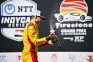 Alex Palou celebrates with champagne at IndyCar's Firestone Grand Prix of St. Petersburg - Source: Getty
