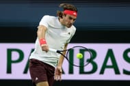 Stefanos Tsitsipas of Greece returns a shot to Thiago Seryboth Wild of Brazil during the BNP Paribas Open - Source: Getty
