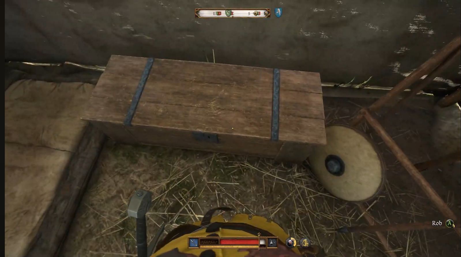 The chest containing the original sword can be found inside a white and green tent (Image via Deep Silver || YouTube/Quick Tips)