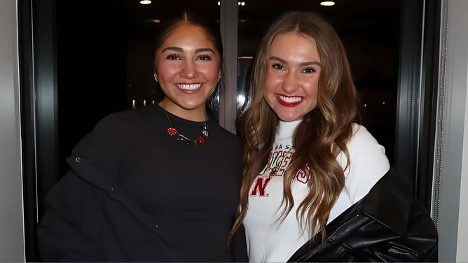 Nebraska Volleyball's Maisie Boesiger shows off Coach's special gesture for Lexi Rodriguez during Beach Volleyball game