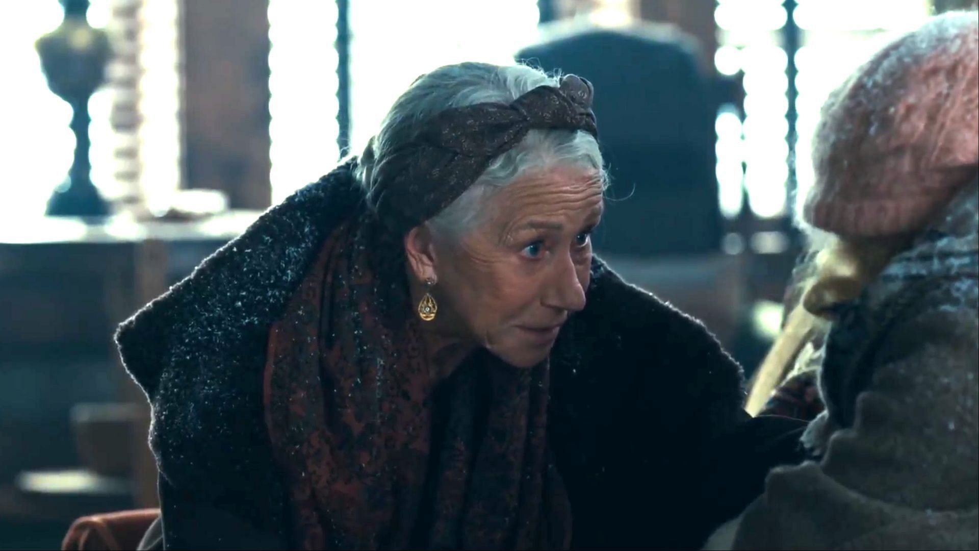 Helen Mirren as Cara Dutton helps Elizabeth as she comes home wounded from an attack. (Image via Paramount+)