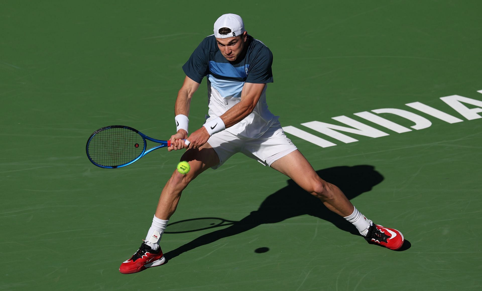 Draper plays a backhand in the BNP Paribas Open - Day 11 - Source: Getty