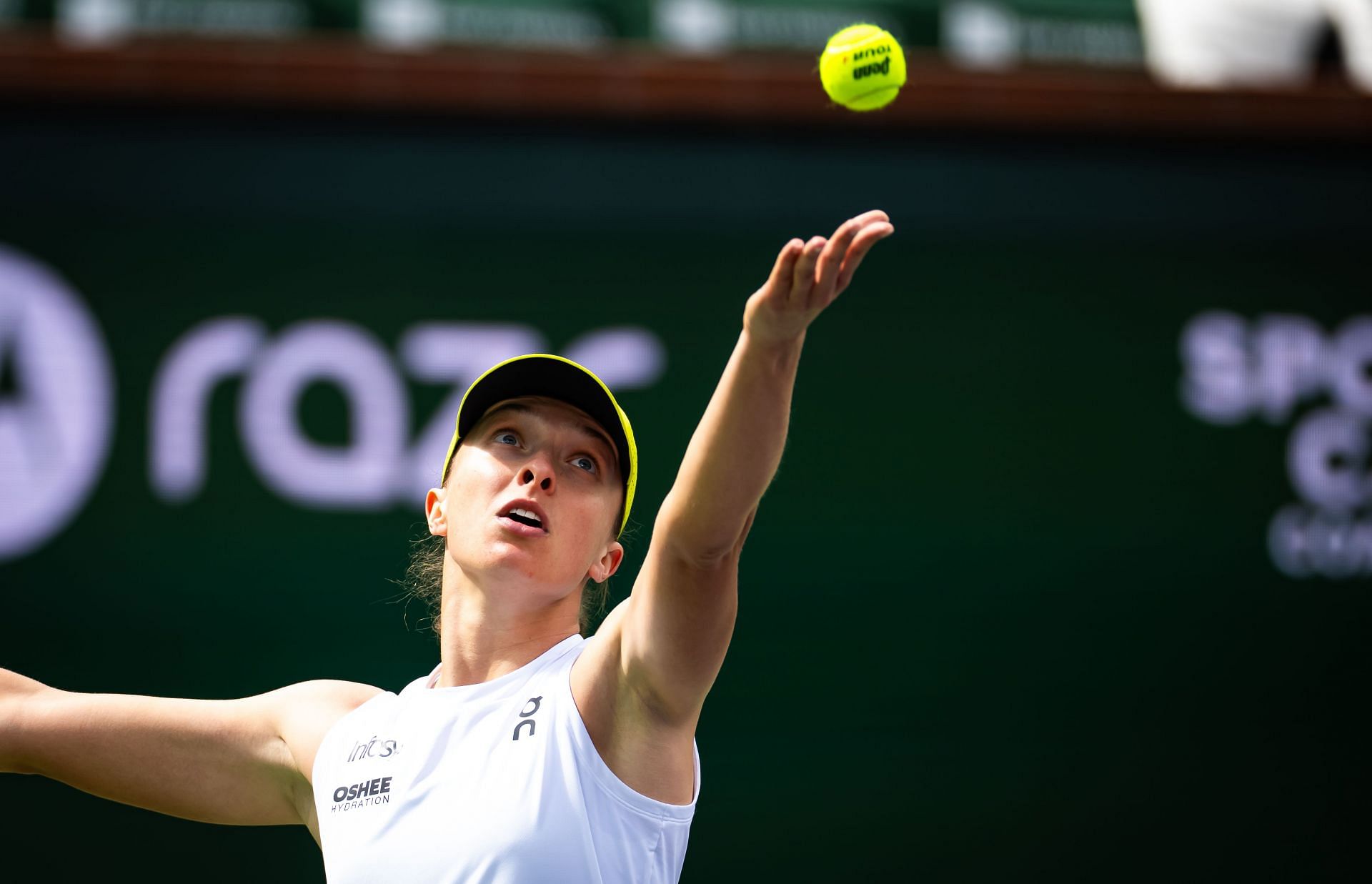 Iga Swiatek serves at BNP Paribas Open 2025 | Image Source: Getty