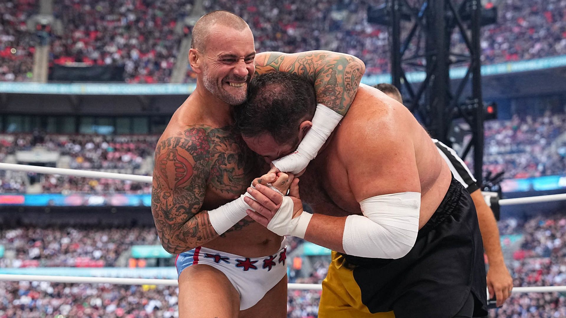 Punk and Joe lock up at All In 2023 [Image credit: AEW