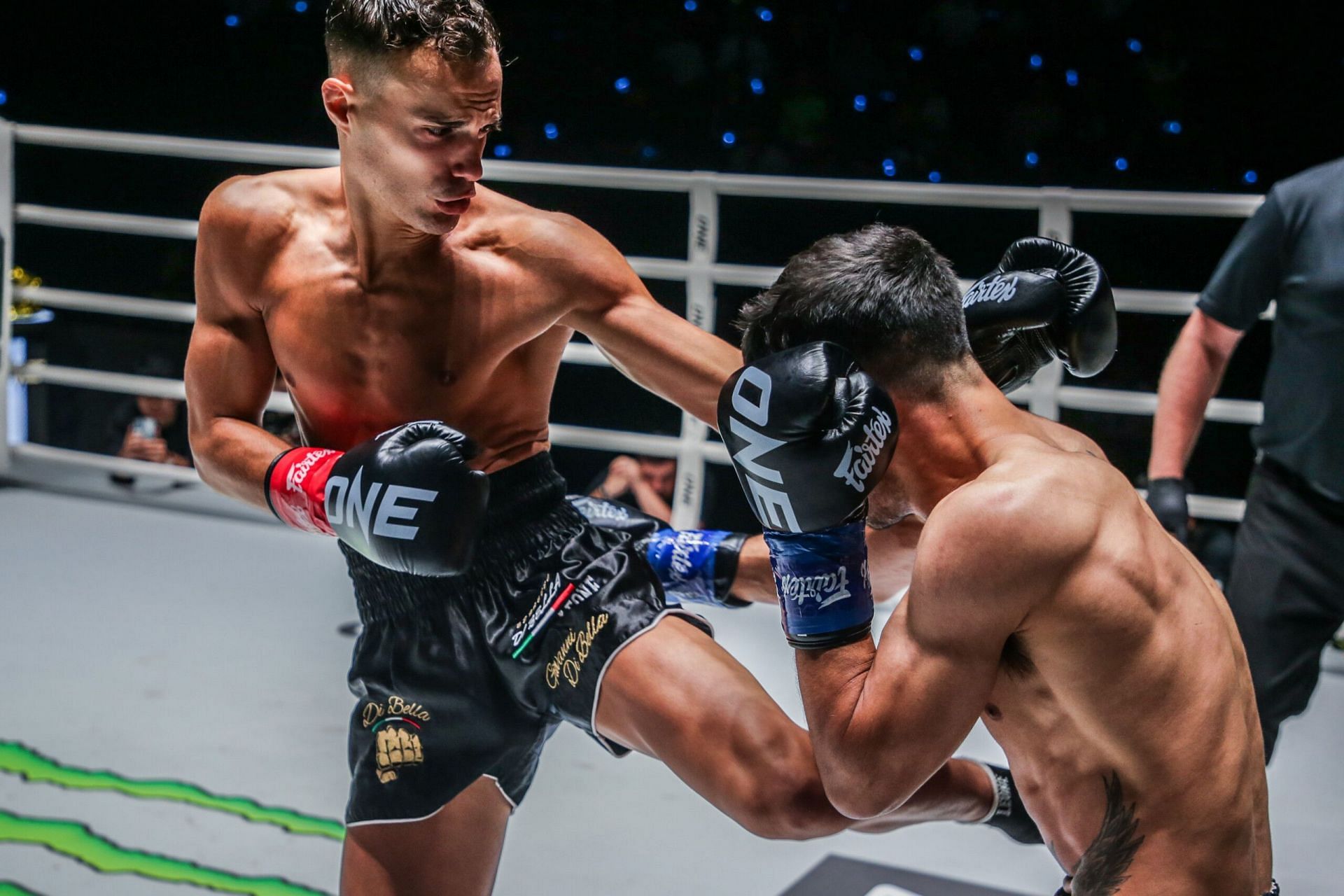 Jonathan Di Bella (left) attacks the body of Danial Williams [Photo via ONE Championship]