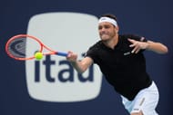 Taylor Fritz of the United States returns a shot against Lorenzo Sonego of Italy in the second round of the Miami Open - Source: Getty