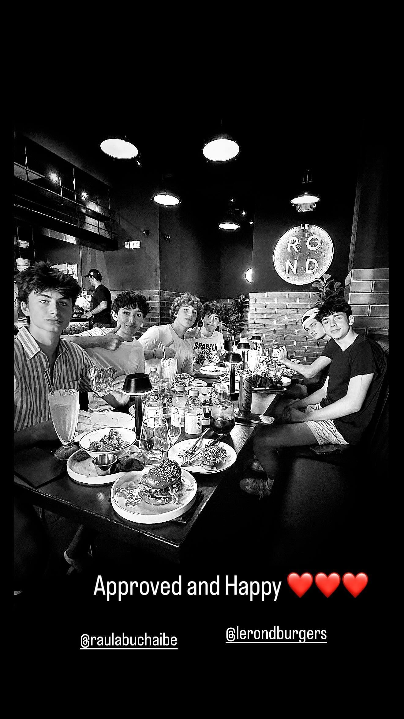 The Bradys and their friends eating at Le Rond