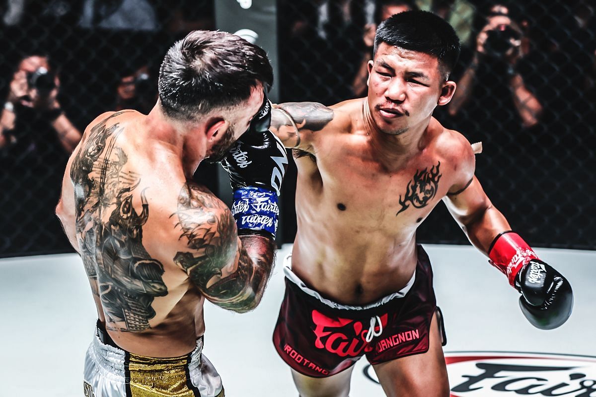 Rodtang (right) hammers way in his bout against Denis Puric [Photo via ONE Championship]