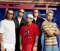 "Literally the only band worth going for" — Netizens react as metal band Korn returns to Lollapalooza after 28 years