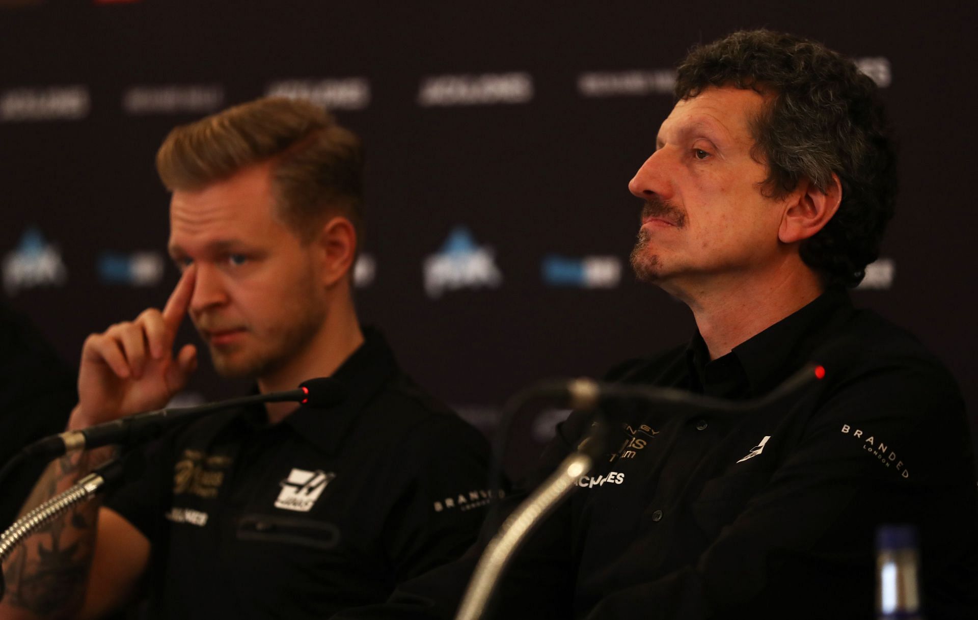 Kevin Magnussen (L) and Guenther Steiner (R) Rich Energy Haas F1 Team Livery Unveil - Source: Getty