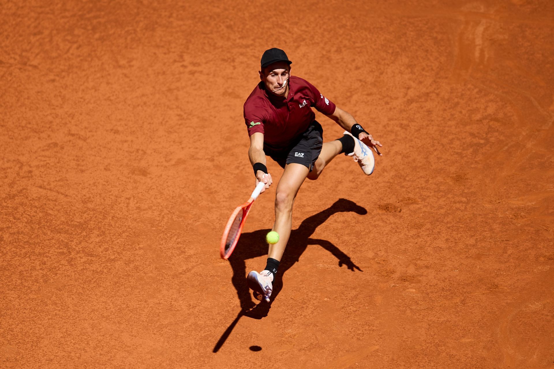 Matteo Arnaldi chases down a shot in Madrid | Image Source: Getty