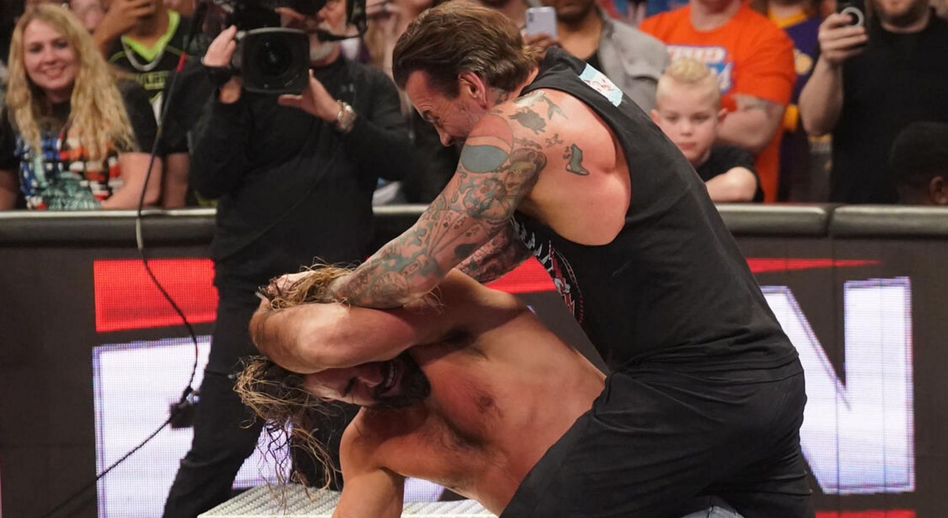 WWE, CM Punk, Roman Reigns, Paul Heyman, Seth Rollins