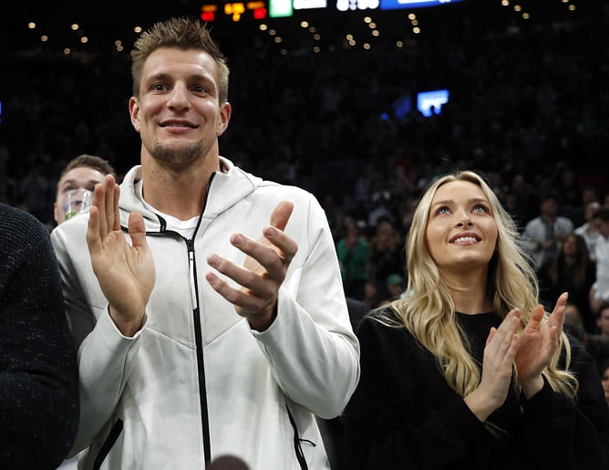 PHOTO: Rob Gronkowski and Camille Kostek relax together on boat ride amid their busy schedules