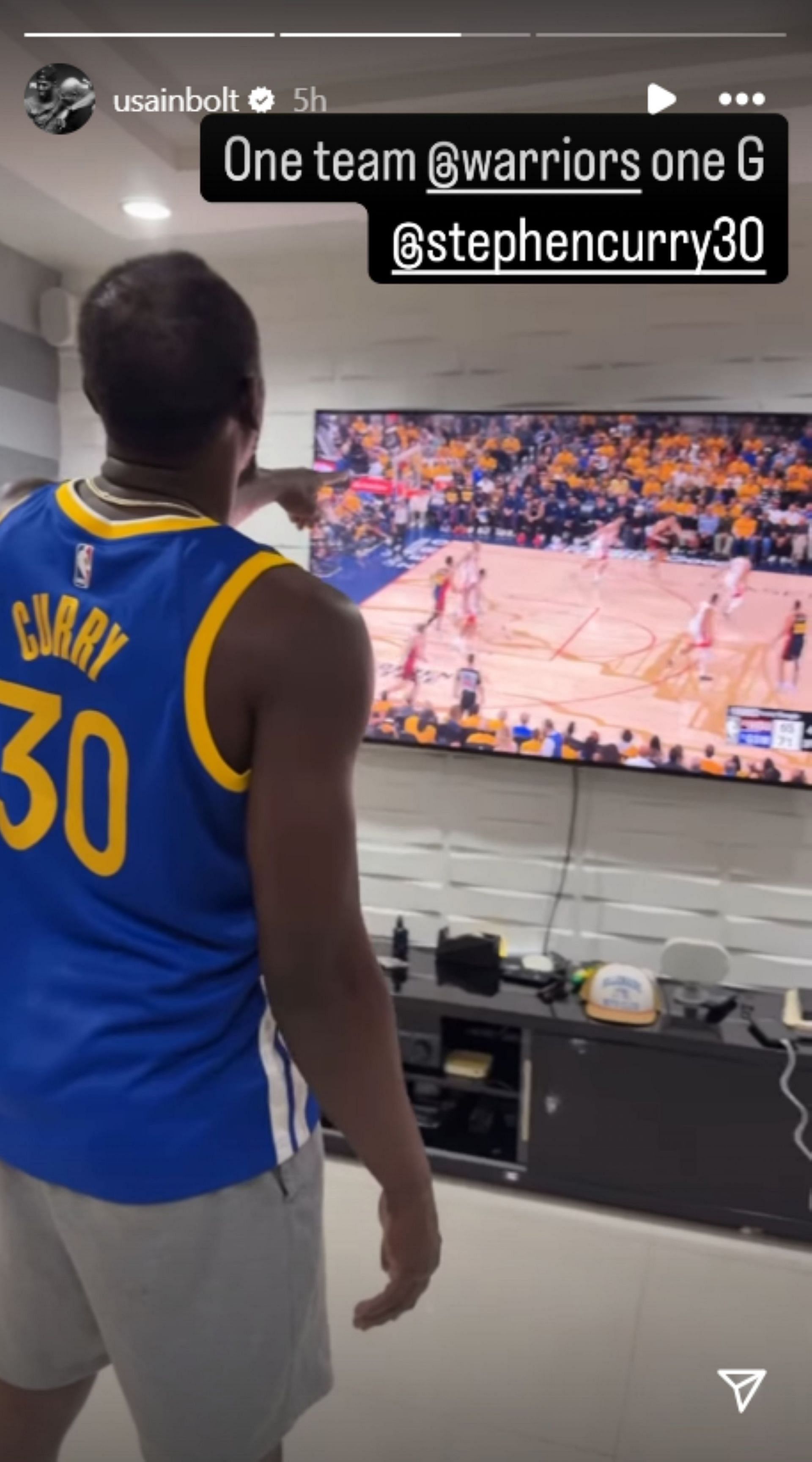Bolt cheers on Golden State Warriors in Curry jersey; Instagram - @usainbolt