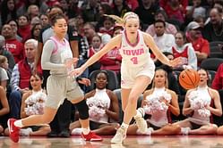 Kylie Feuerbach drops 2 words for teammate Sydney Affolter as Iowa stars pose in front of Chicago Bulls’s NBA trophies