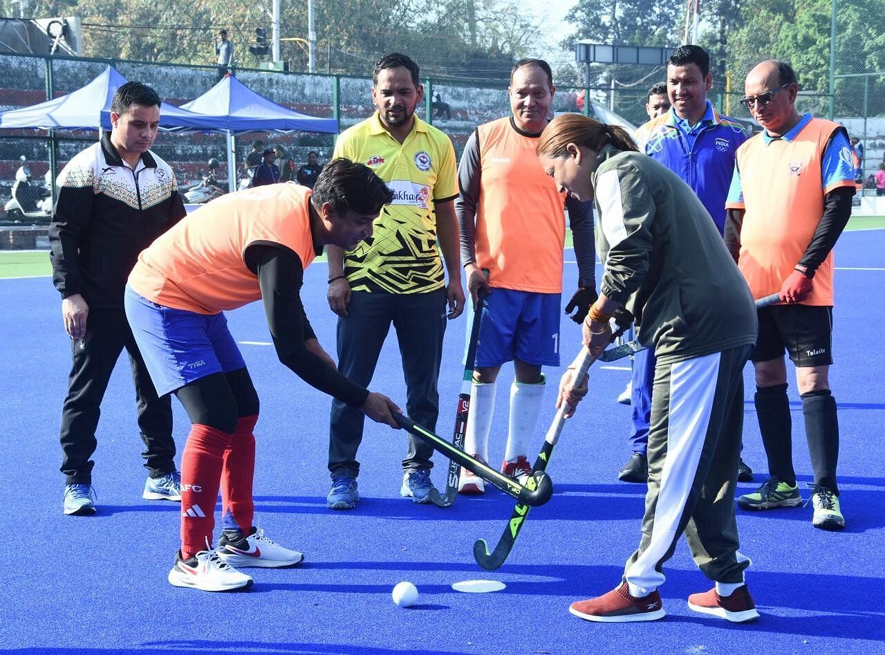 Uttarakhand Sports Minister Rekha Arya playing Hockey