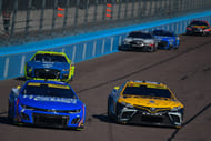 Kyle Larson (5) and driver Christopher Bell (20) race for position during the Cup Series Championship race at Phoenix Raceway, November 5th 2023 - Source: Imagn