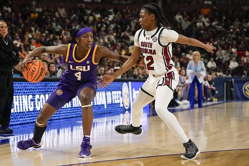 LSU Tigers guard Flau'jae Johnson (#4) handles the ball against South Carolina Gamecocks guard MiLaysia Fulwiley (#12) during the first half at Bon Secours Wellness Arena. Photo: Imagn