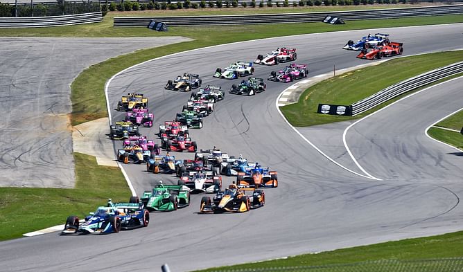 Which IndyCar driver holds the most wins at Barber Motorsports Park?