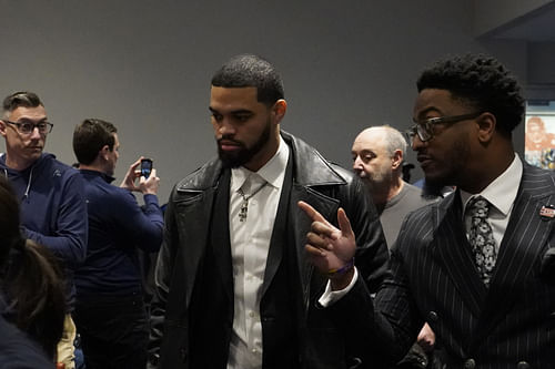 Chicago Bears quarterback Caleb Williams arrives at a press conference introducing new head coach Ben Johnson at PNC Center. - Source: Imagn