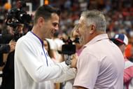 Florida Gators head coach Todd Golden talks with Auburn Tigers head coach Bruce Pearl before their game at Neville Arena. Photo: Imagn