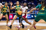 Florida State Seminoles guard Ta'Niya Latson (#00) drives to the basket against George Mason Patriots forward Nekhu Mitchell (#11) during the first half at Pete Maravich Assembly Center. Photo: Imagn