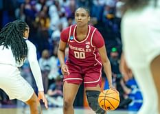 South Carolina's Ta'Niya Latson flaunts "new threads" with Dawn Staley and Raven Johnson