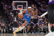 Oklahoma City Thunder guard Shai Gilgeous-Alexander dribbles past Sacramento Kings guard Keon Ellis at the Golden 1 Center. Photo Credit: Imagn