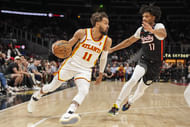 Atlanta Hawks guard Trae Young dribbles against Portland Trail Blazers guard Shaedon Sharpe at State Farm Arena. Photo Credit: Imagn
